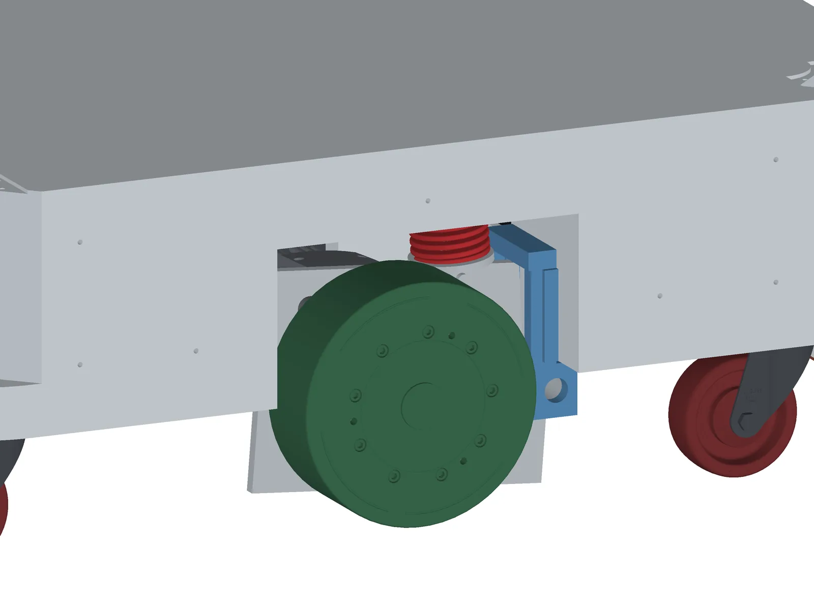 Drive unit at full compression: spring short, wheel raised.