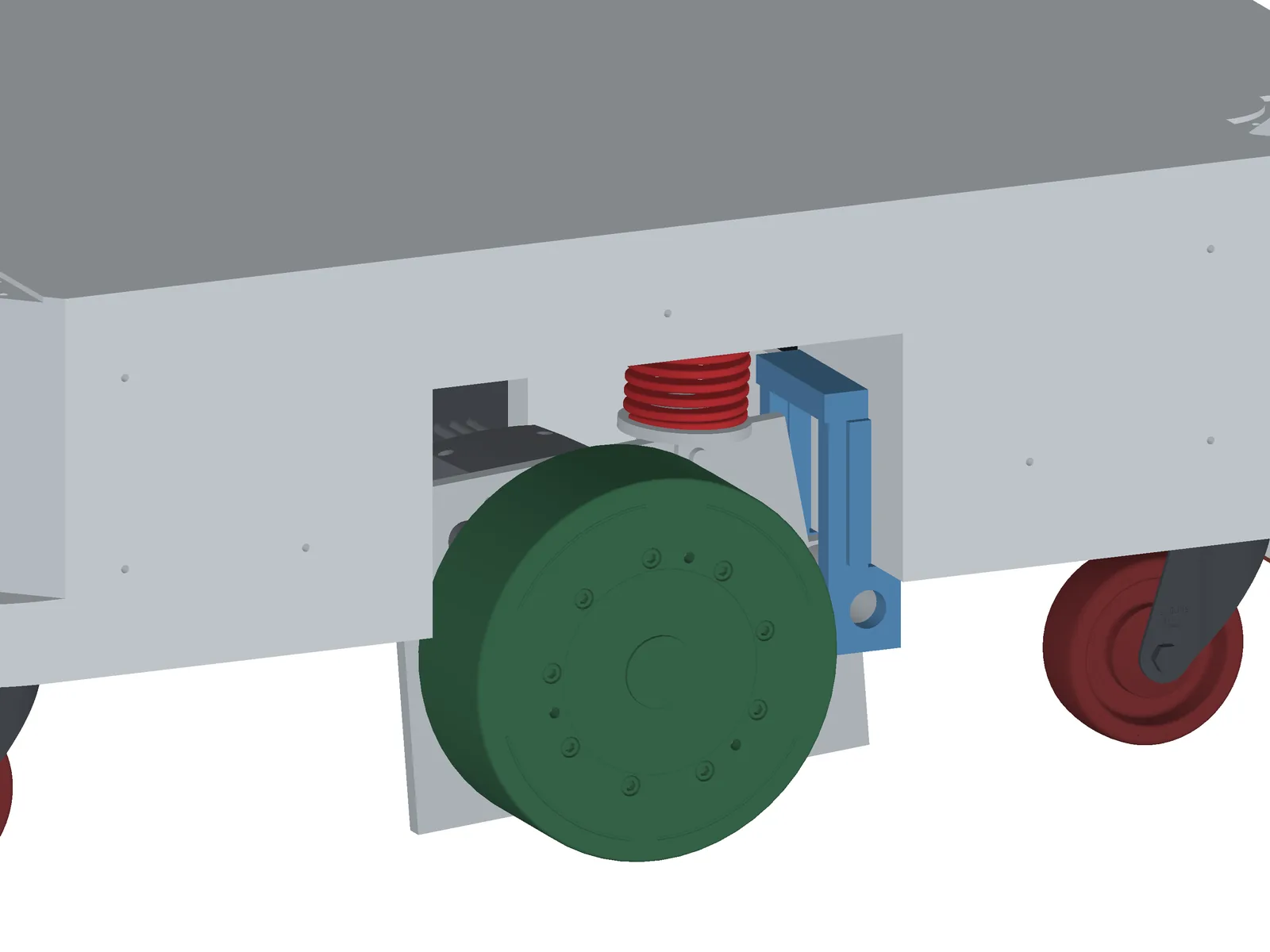 Drive unit at full extension: spring long, wheel dropped.